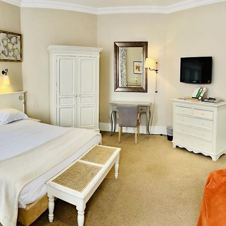 Hotel & Restaurant Le Central Trouville Pokoj fotografie